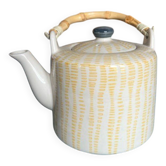Cream, yellow and blue porcelain teapot with bamboo handle