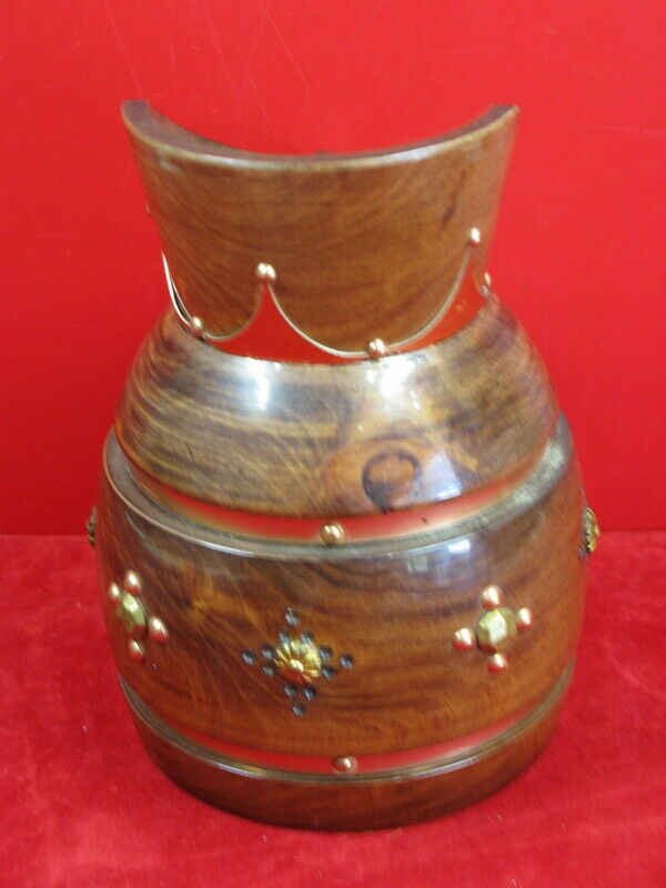 Wooden pitcher and vintage copper decoration