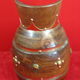 Wooden pitcher and vintage copper decoration