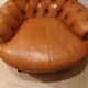Pair of leather chesterfield chairs