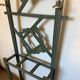 Art Deco coat rack in green patinated wood