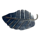Silver metal leaf pocket emptier