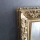Antique mirror in wood and gilded stucco