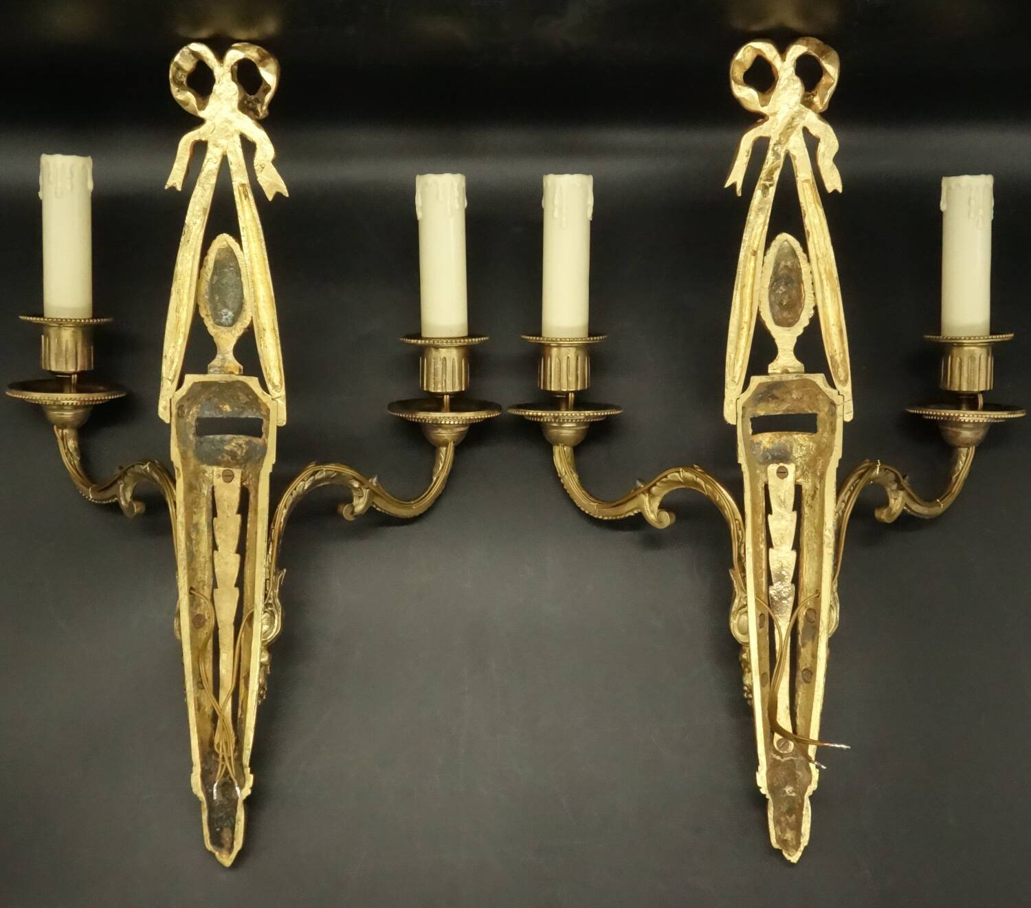 Pair of large wall sconces with bow in Louis XVI style from the 19th century - bronze