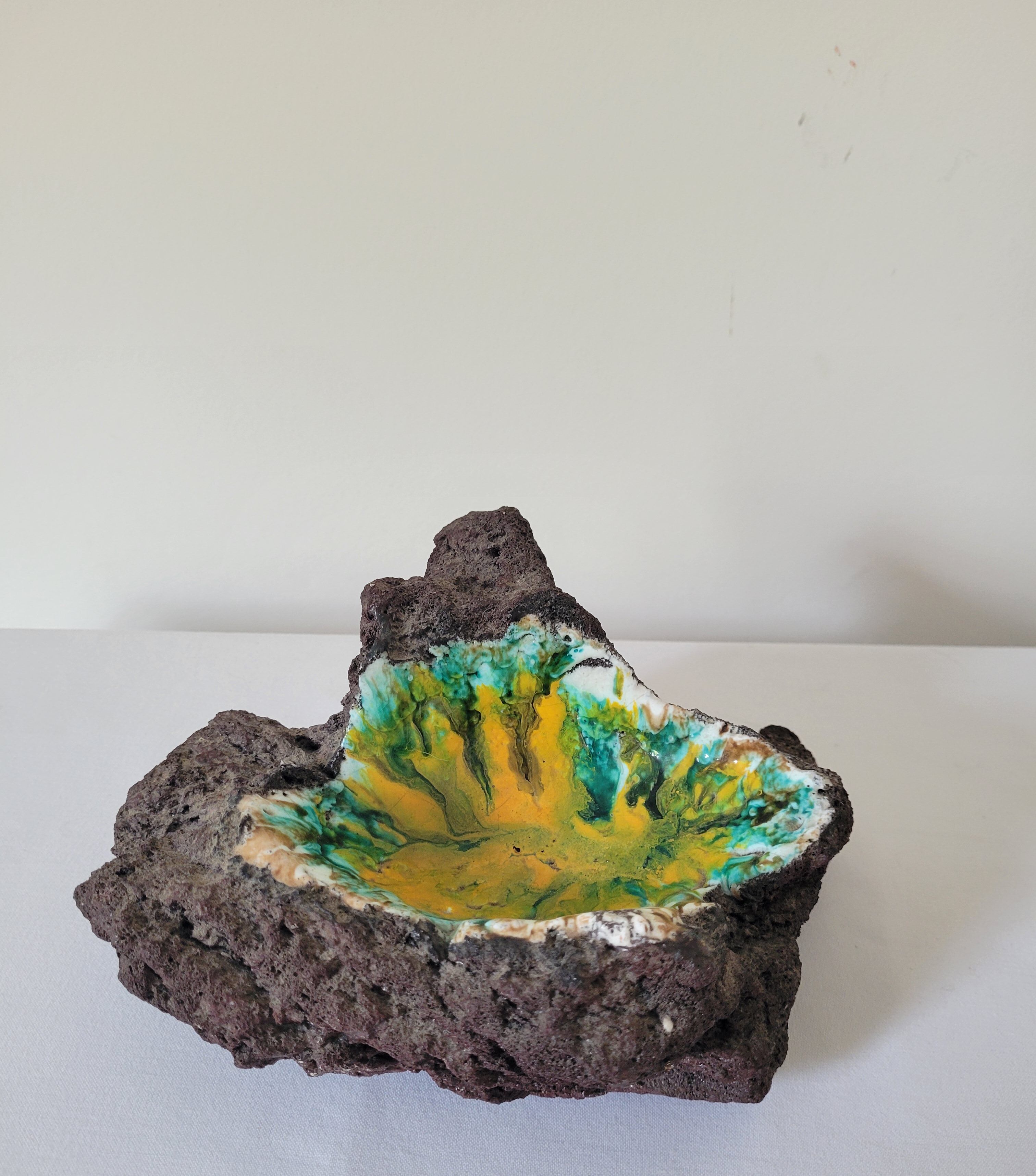 Enamelled lava stone ashtray