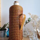 Thermos bottle with wicker canning