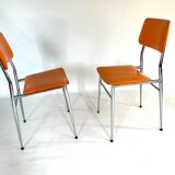Pair of vintage orange leatherette chairs
