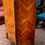 Old French secretary in bronze and wood marquetry.