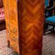 Old French secretary in bronze and wood marquetry.