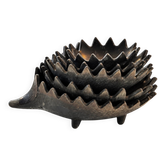 Nested hedgehogs in patinated brass – Walter Bosse