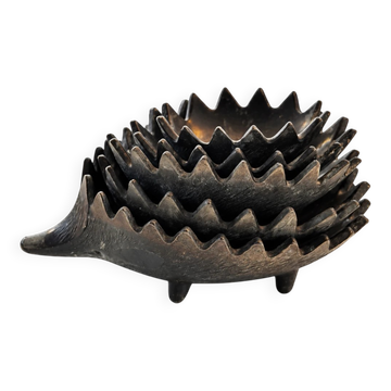 Nested hedgehogs in patinated brass – Walter Bosse