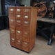 Office furniture has oak drawers 1950 brass handles and label holders