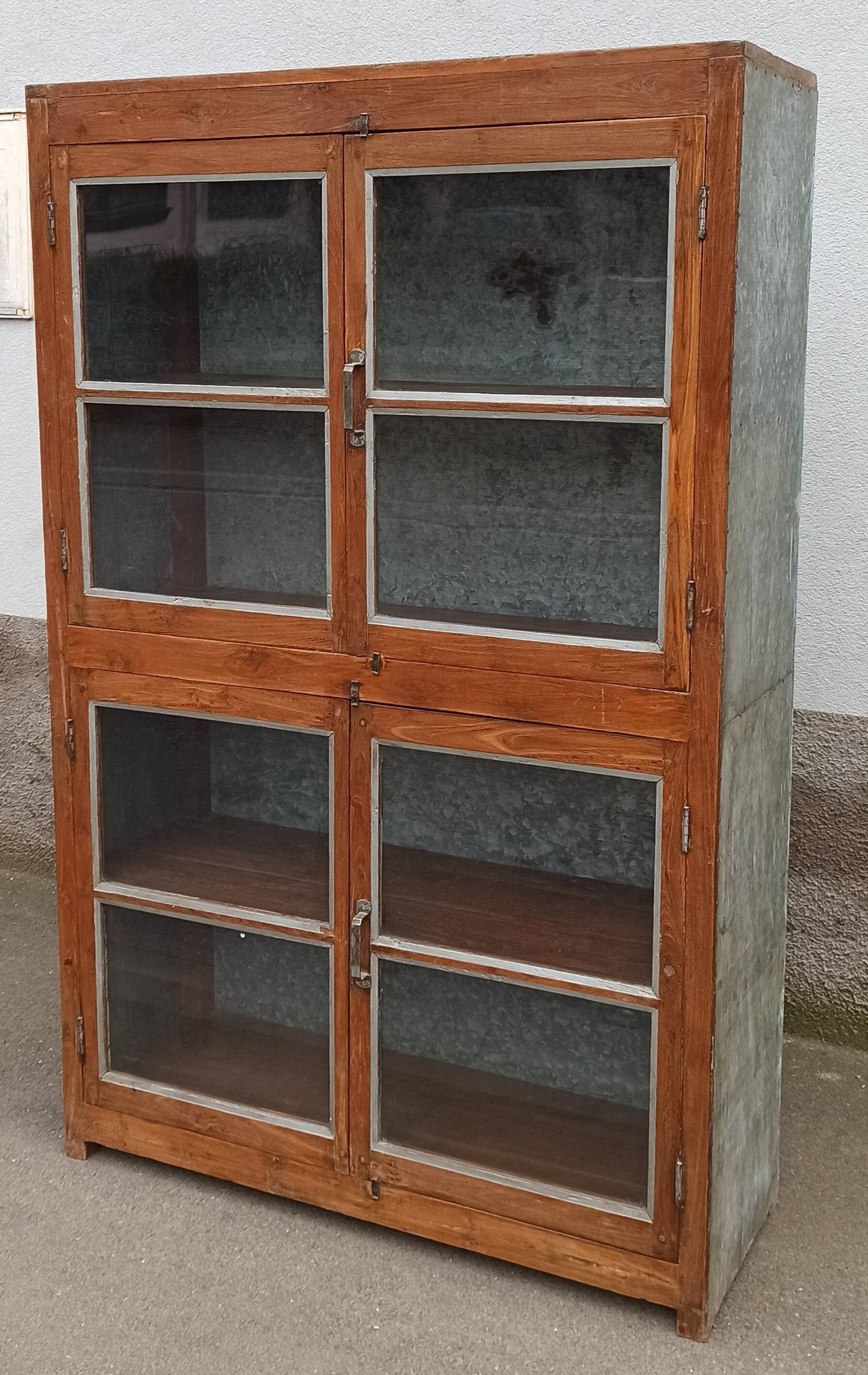 Old glass cabinet in wood and metal