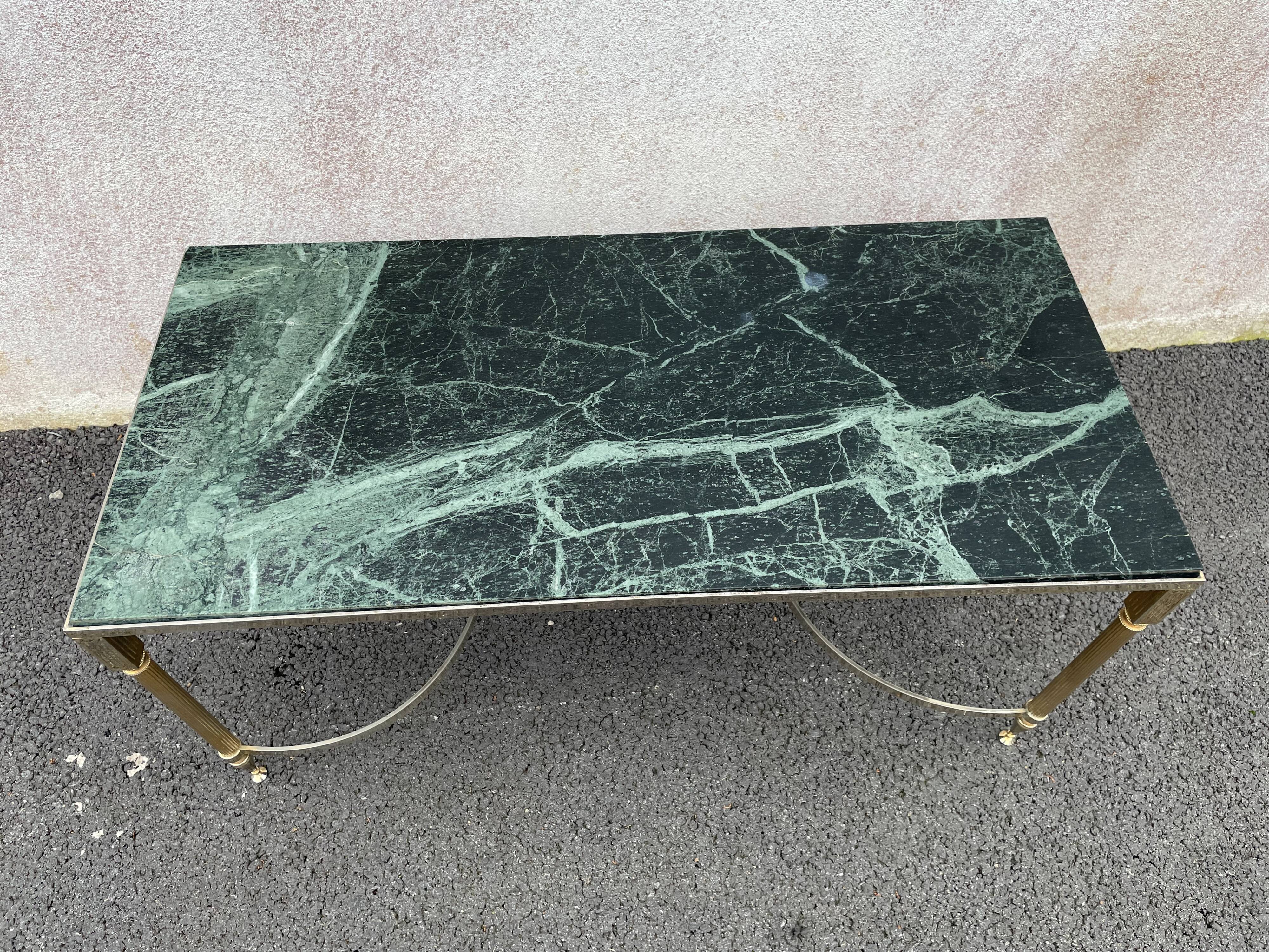 Coffee table in gilded brass and veined green marble