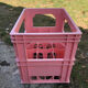 Evian bottle holder in pink plastic