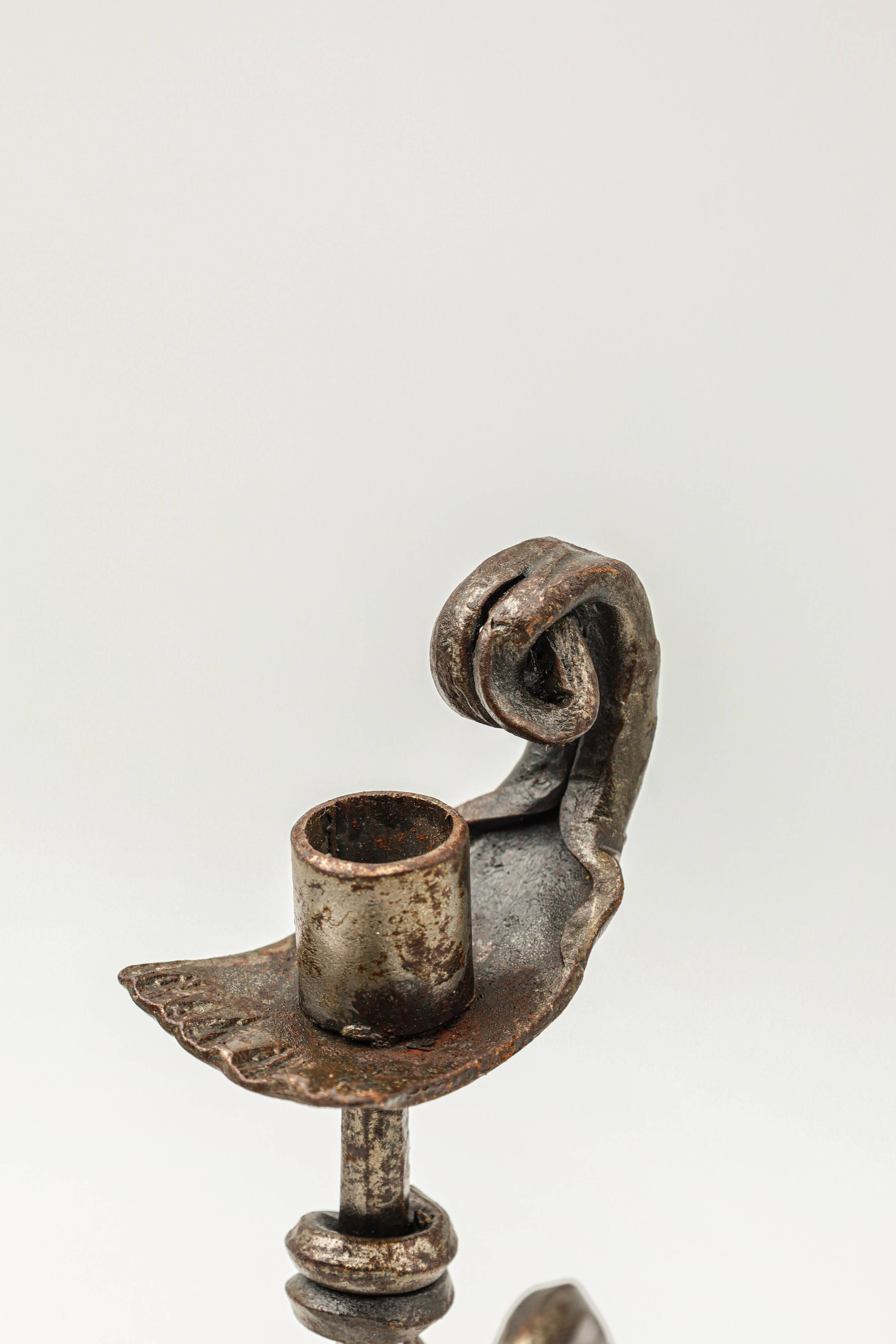 Pair of brutalist wrought iron candlesticks, French work, 1950s-1960s