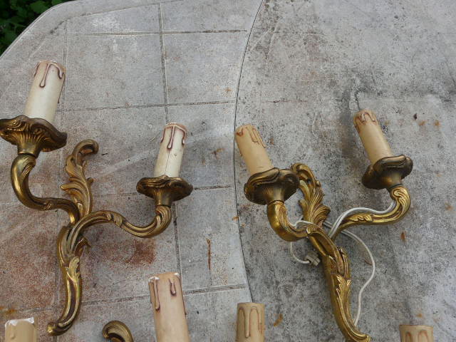 Two pairs of bronze wall lamps