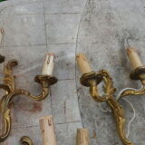 Deux paires d’appliques en bronze