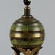 Art Deco table lamp in patinated bronze with eagles holding a globe, France 1940.