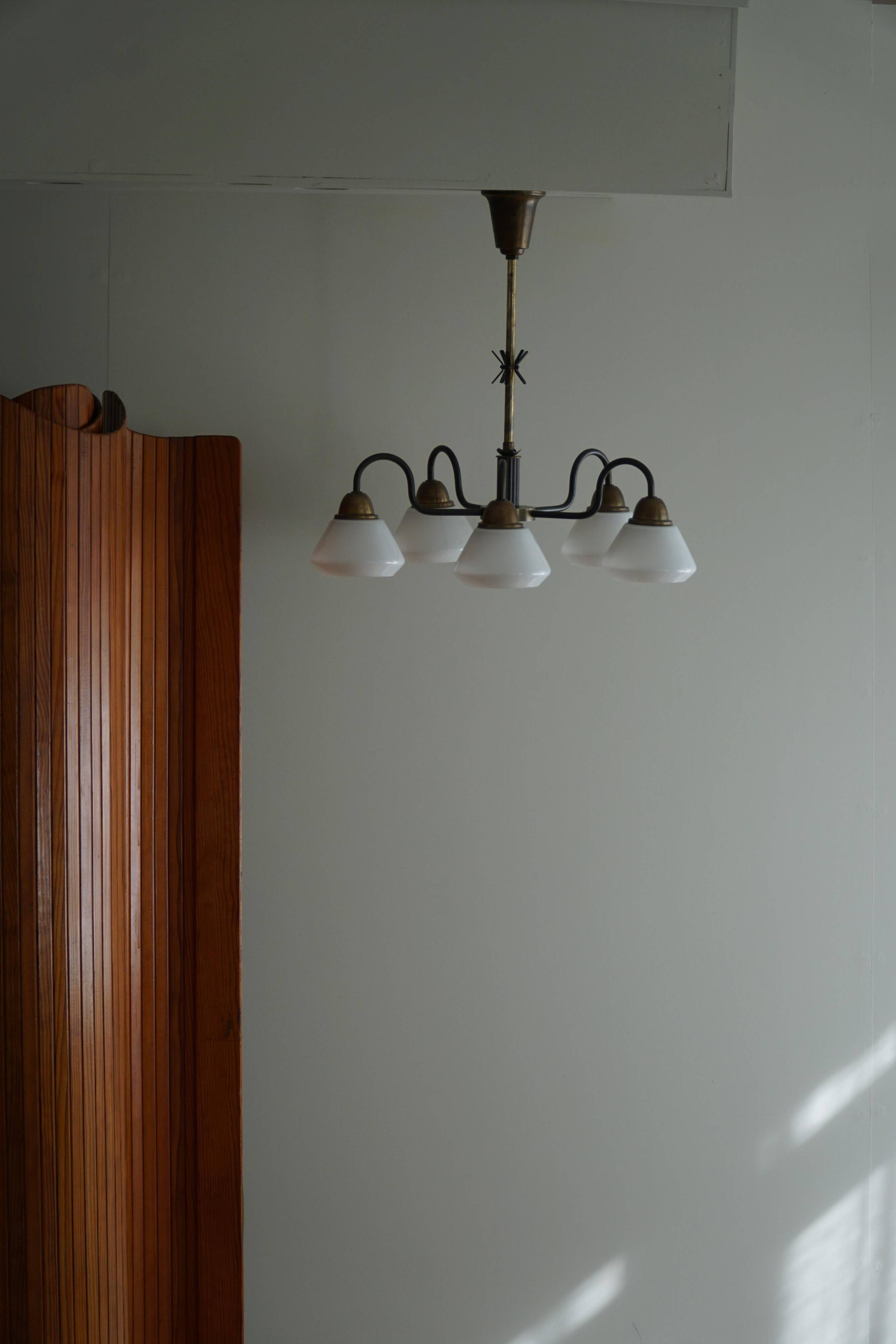 A modern Danish chandelier with 5 heads in opaline glass and brass, Art Deco, 1940s.