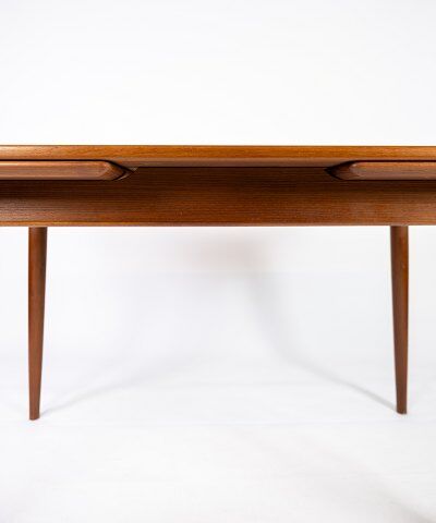 Dining table in teak with extentions of danish design from the 1960s.
