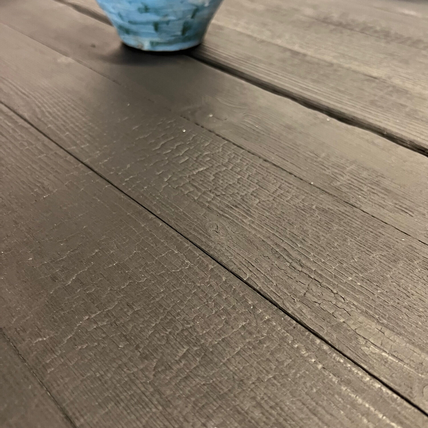 Brutalist round table in burnt wood yakisugi