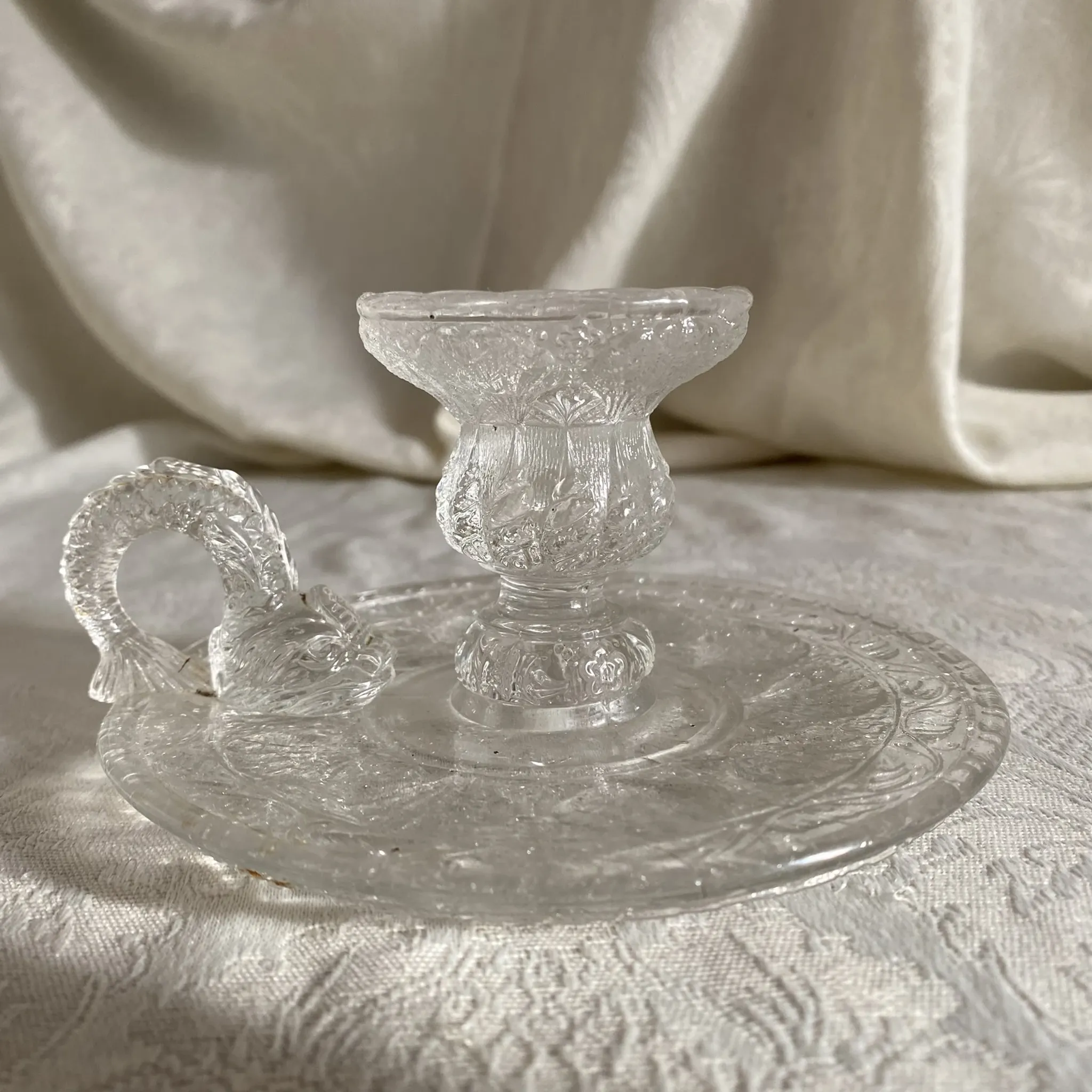 Handheld candlestick with fish handle