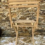Antique folding chair with wooden slats