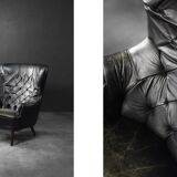 Vintage Danish modern wingback chair in black quilted leather, mid-20th century, 1960s.