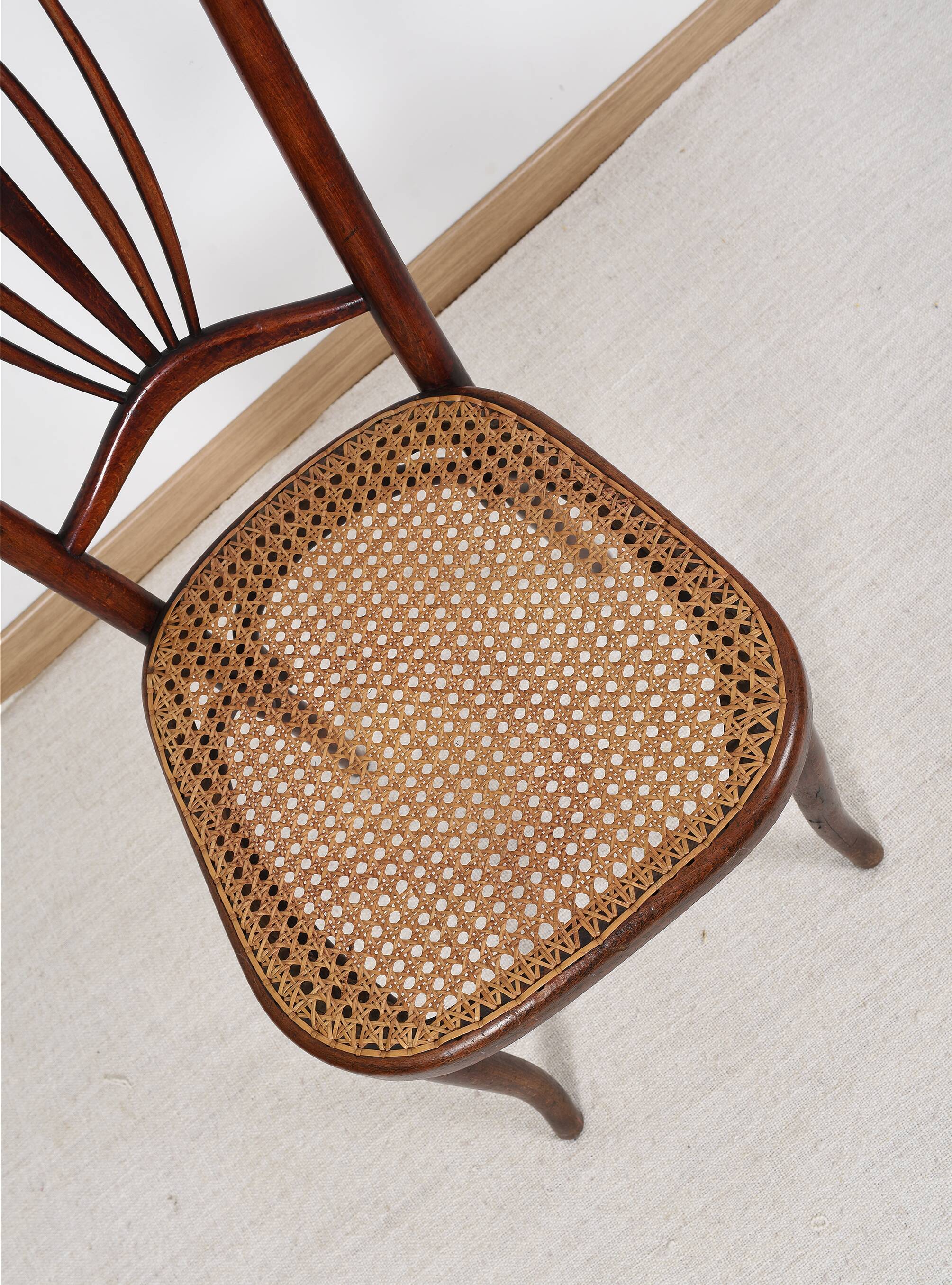 Old cane bistro chair, stamped fischel