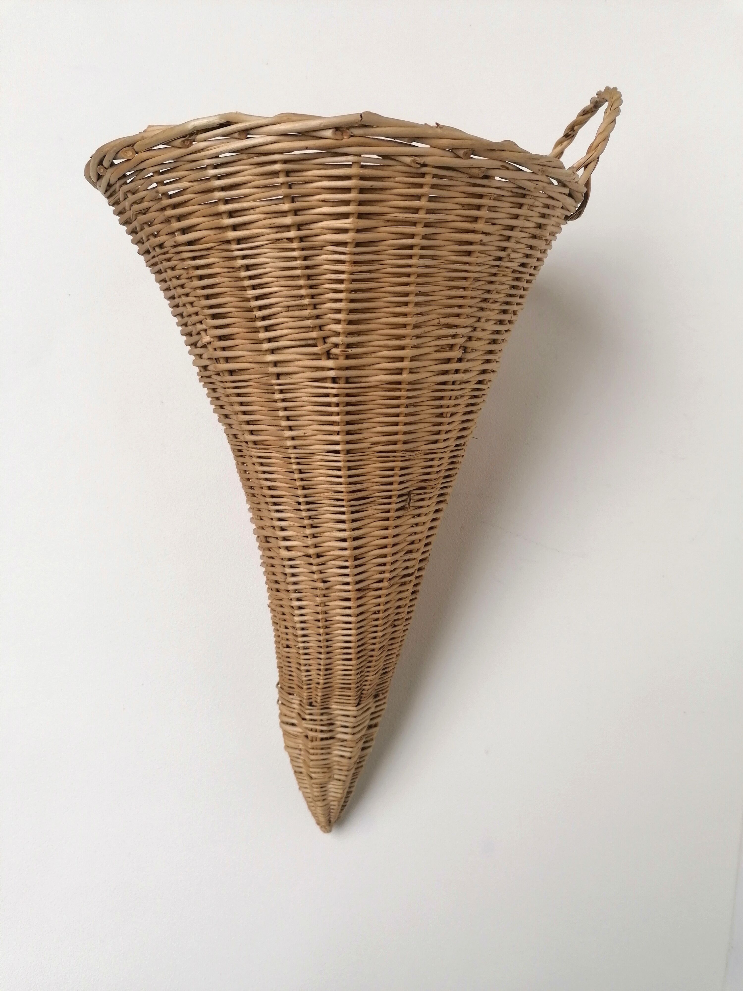 Wicker basket in cornucopia shape