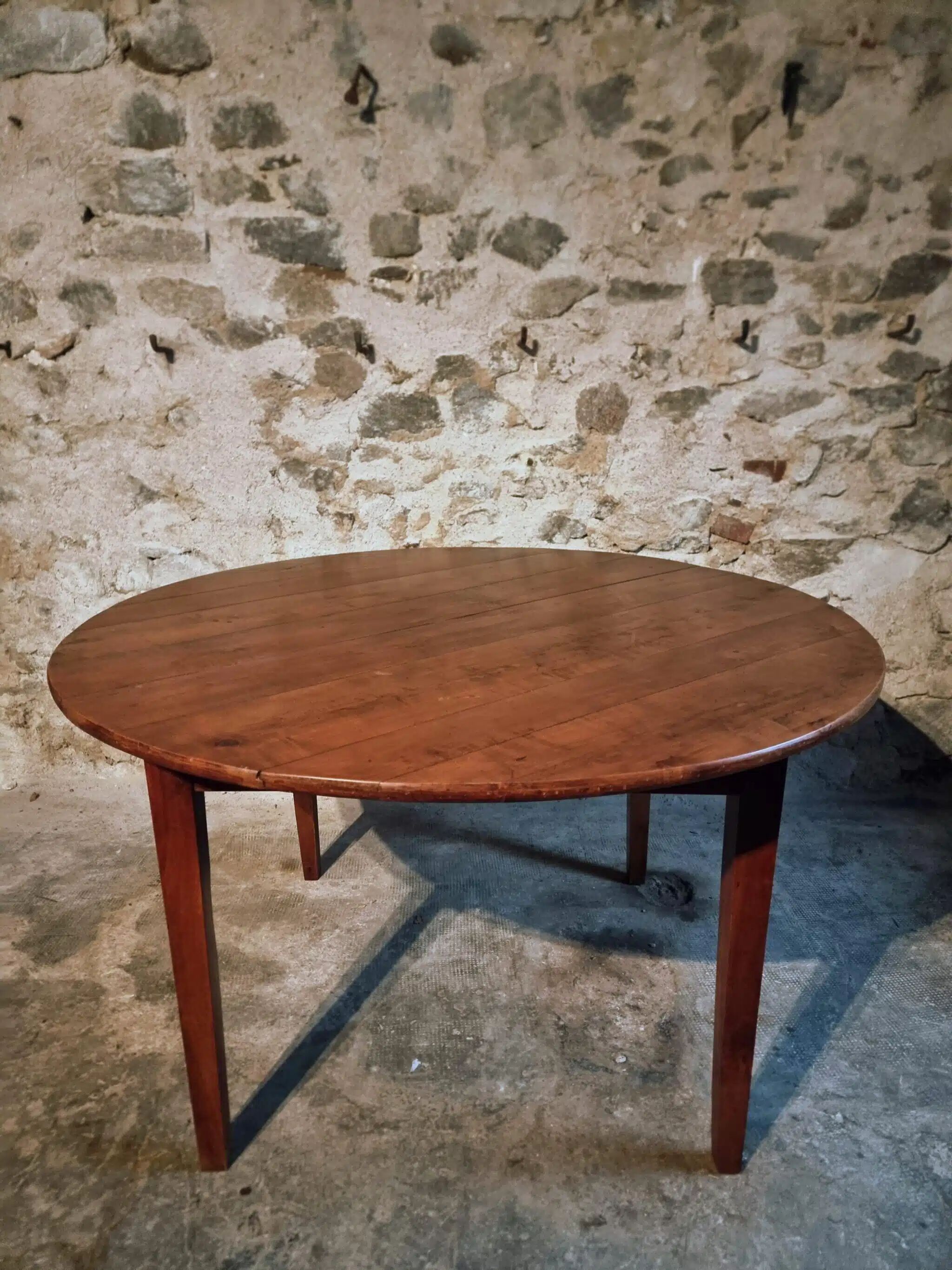 Vintage French round dining table in cherry wood, circa 1920.