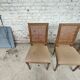 Set of 5 antique wooden and caned chairs.