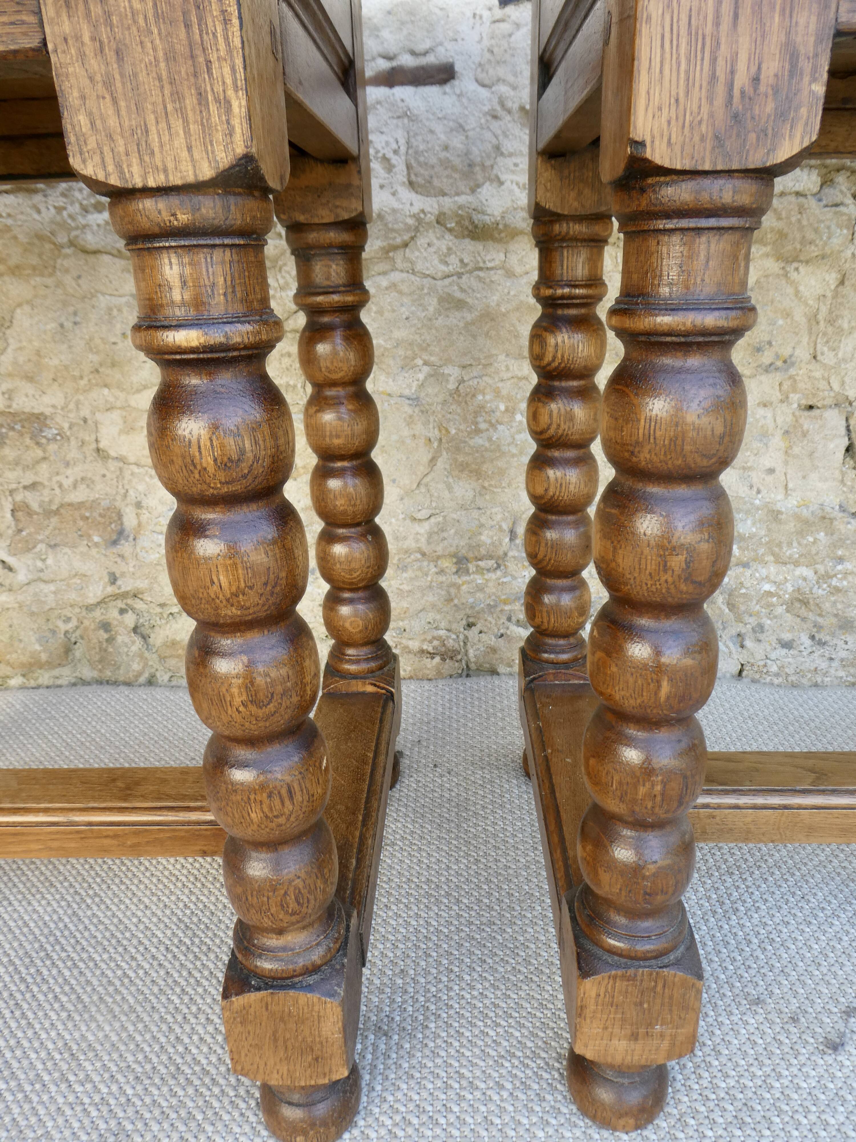 Pair of solid oak bedside tables with carved legs