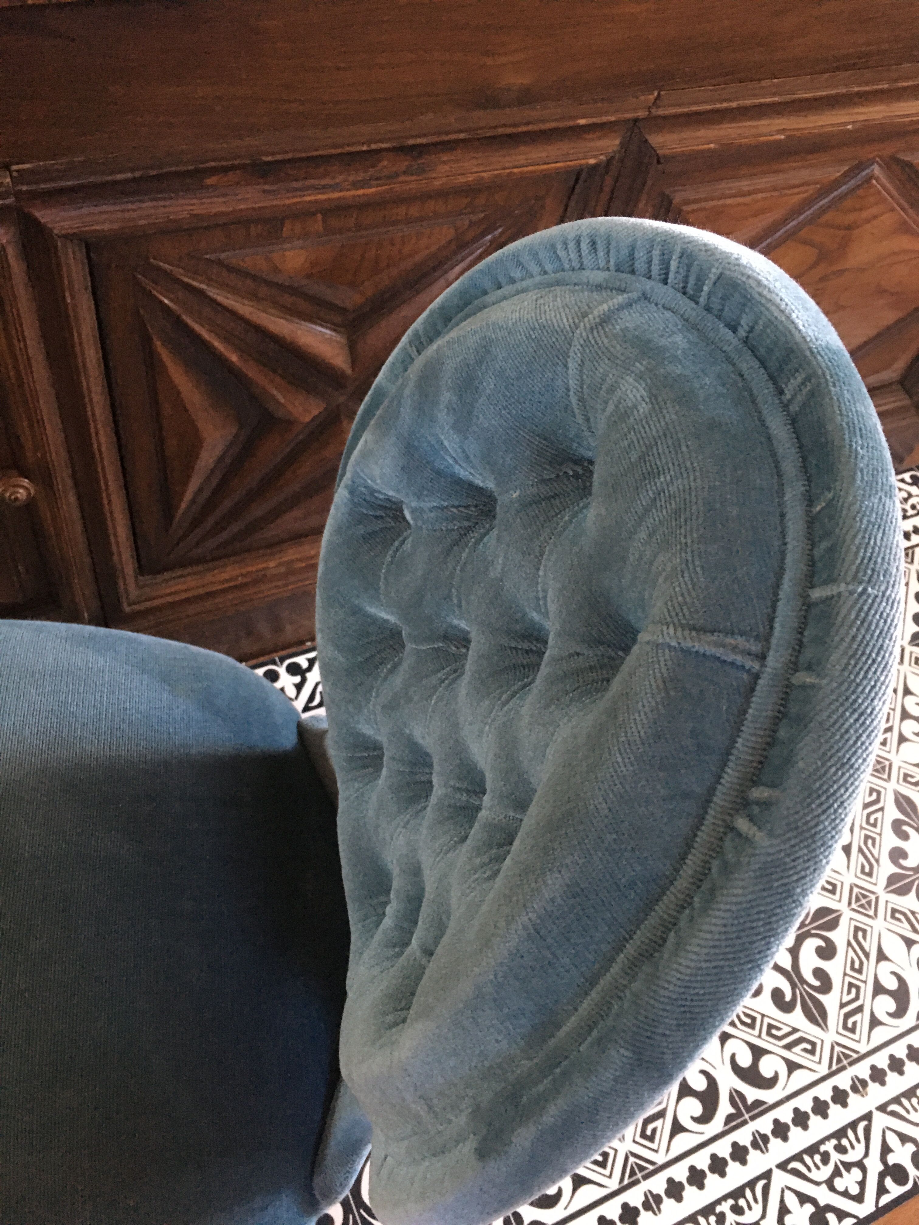Blue heater with fringed medallion shape