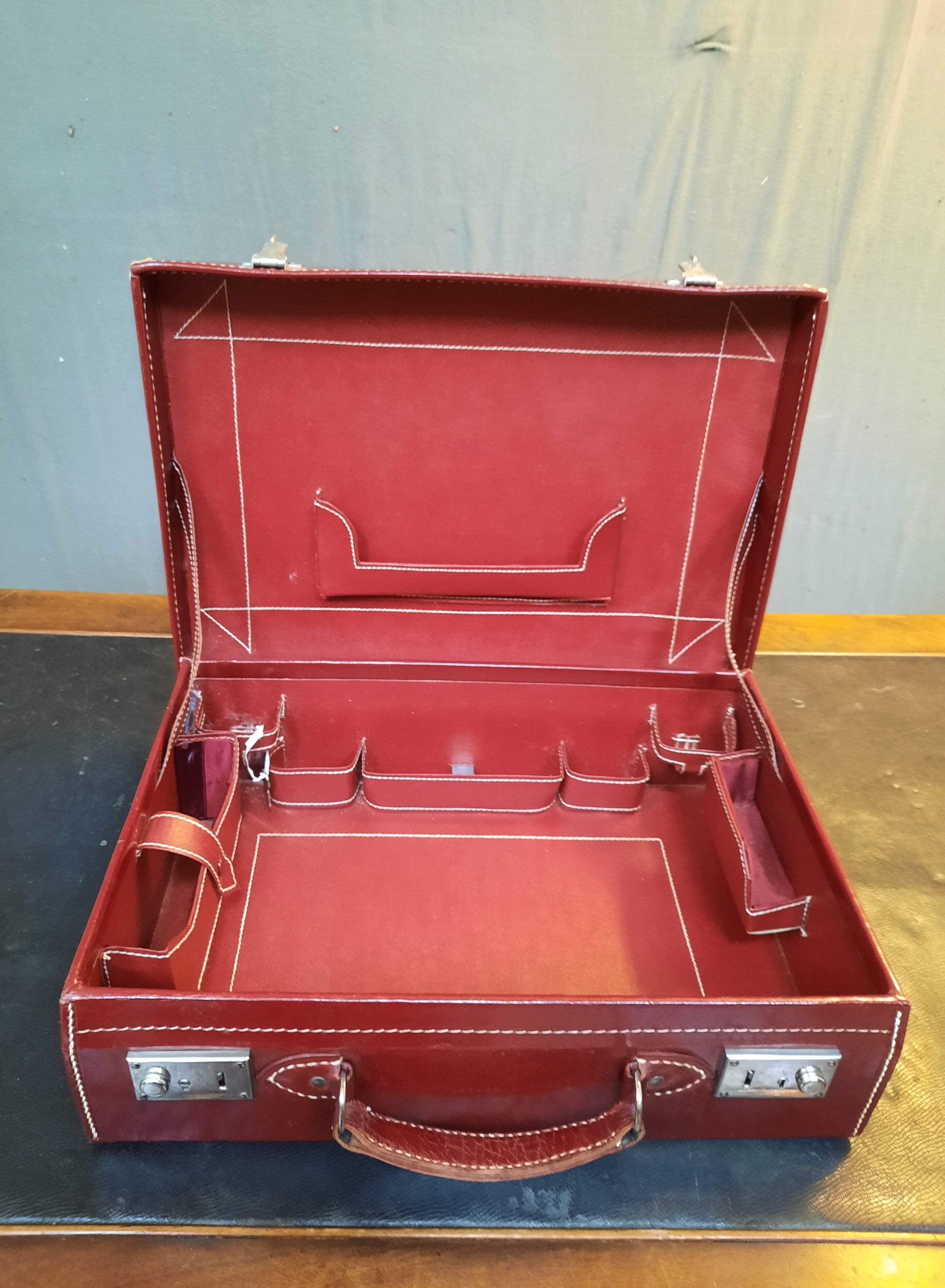 Red leather suitcase
