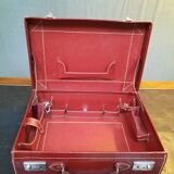 Red leather suitcase