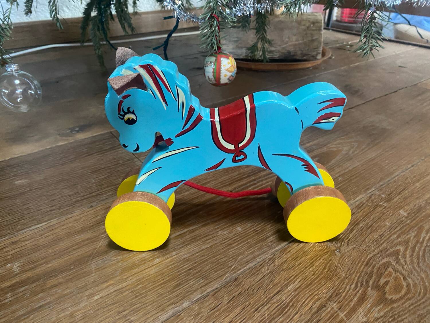 Vintage wooden pull-along horse