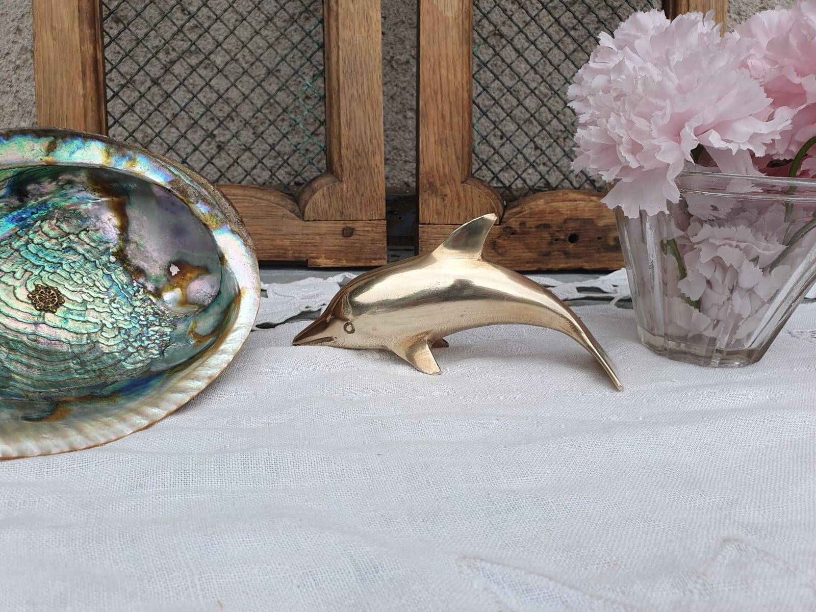brass dolphin