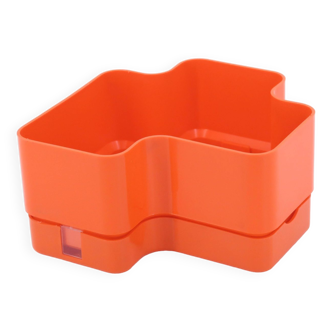 Vastill planter in orange plastic by Michael McCann