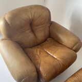 Pair of brown leather armchairs