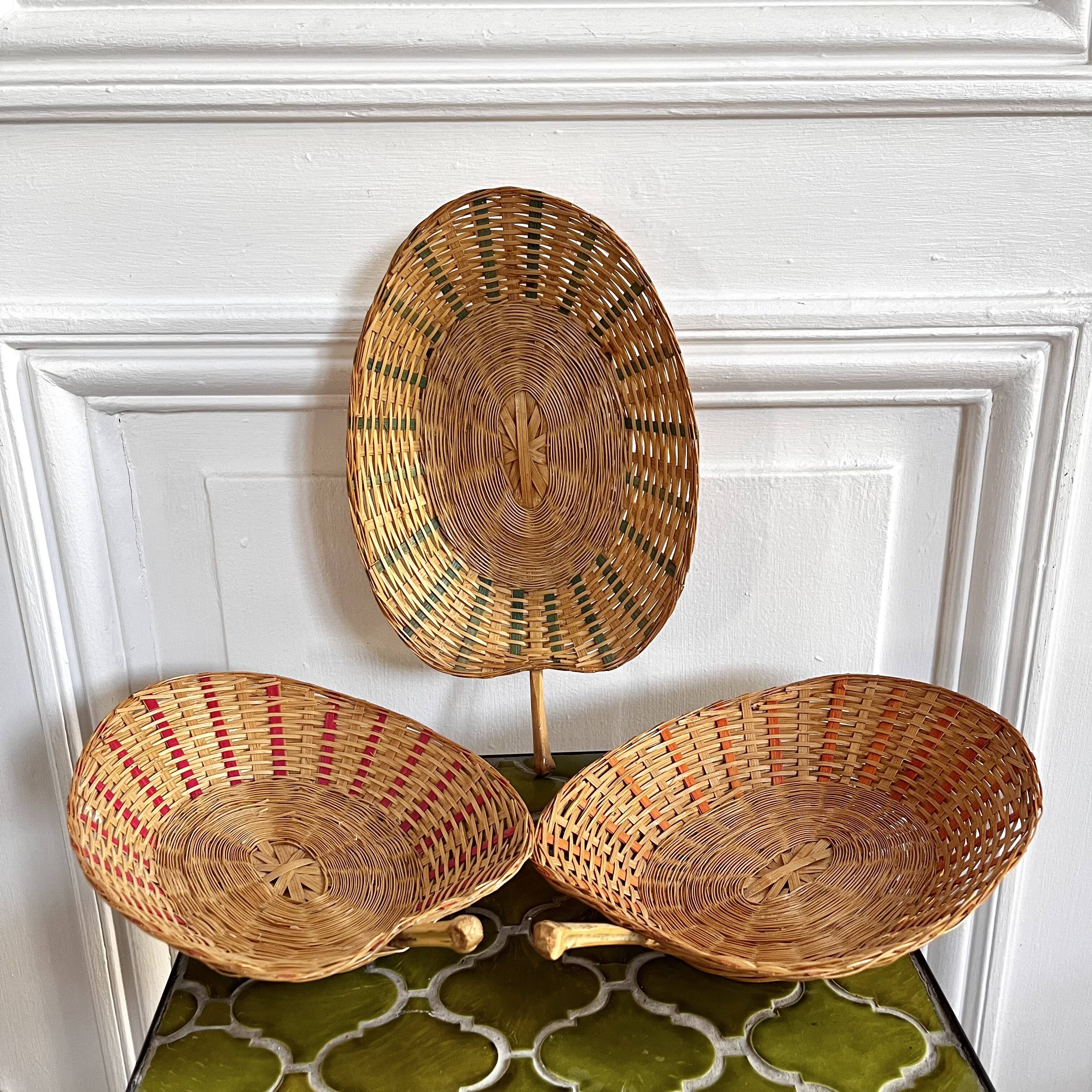 Trio of vintage wicker and bamboo baskets