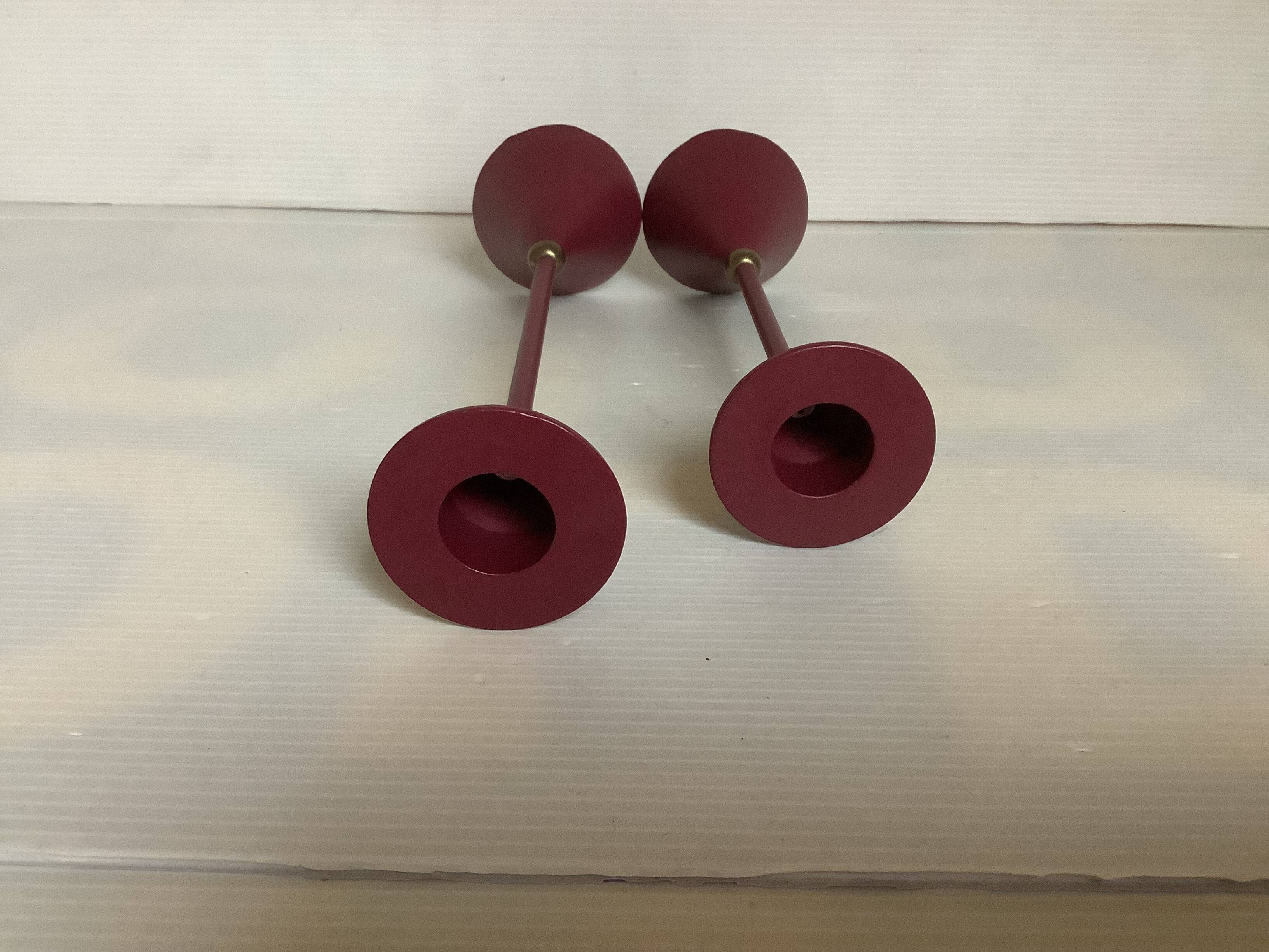 Pair of vintage burgundy candlesticks