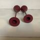 Paire de bougeoirs bordeaux vintage