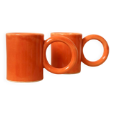 Handmade orange peach ceramic coffee mug set with large circular handles