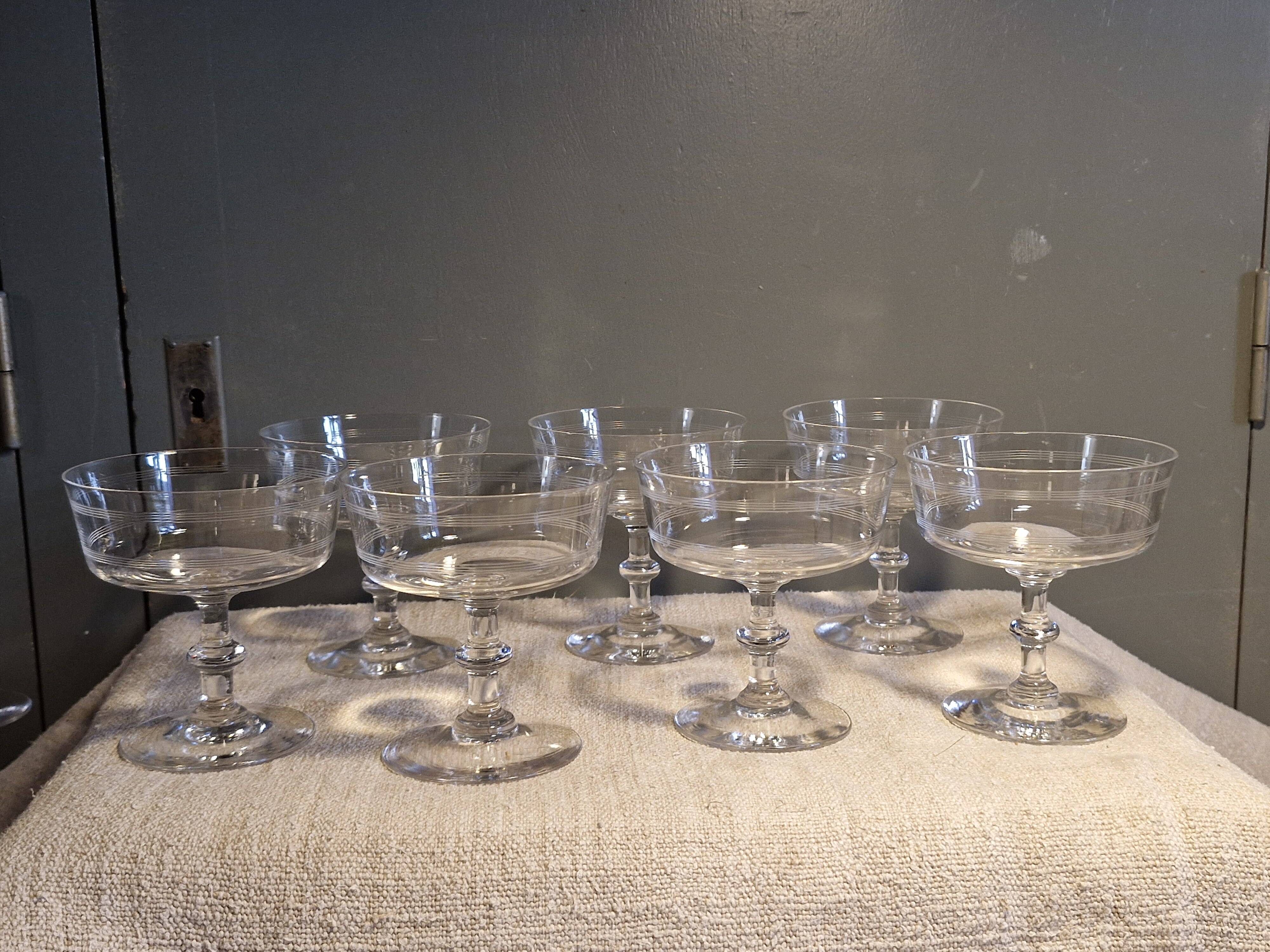 7 crystal champagne coupes from Baccarat - engraved with fillets