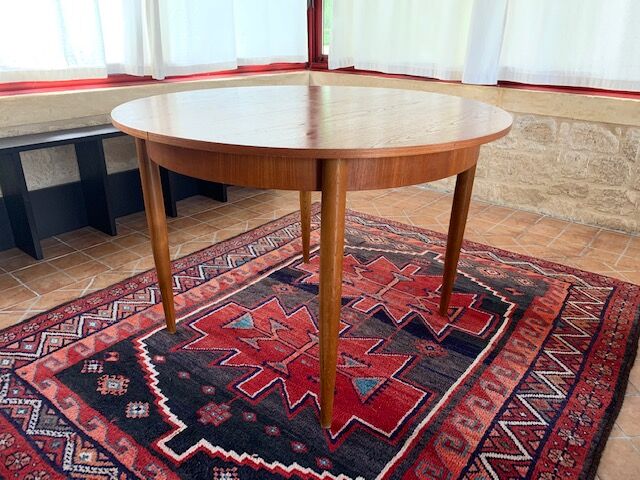 Expandable teak dining table, butterfly extension, circa 60s