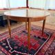 Expandable teak dining table, butterfly extension, circa 60s