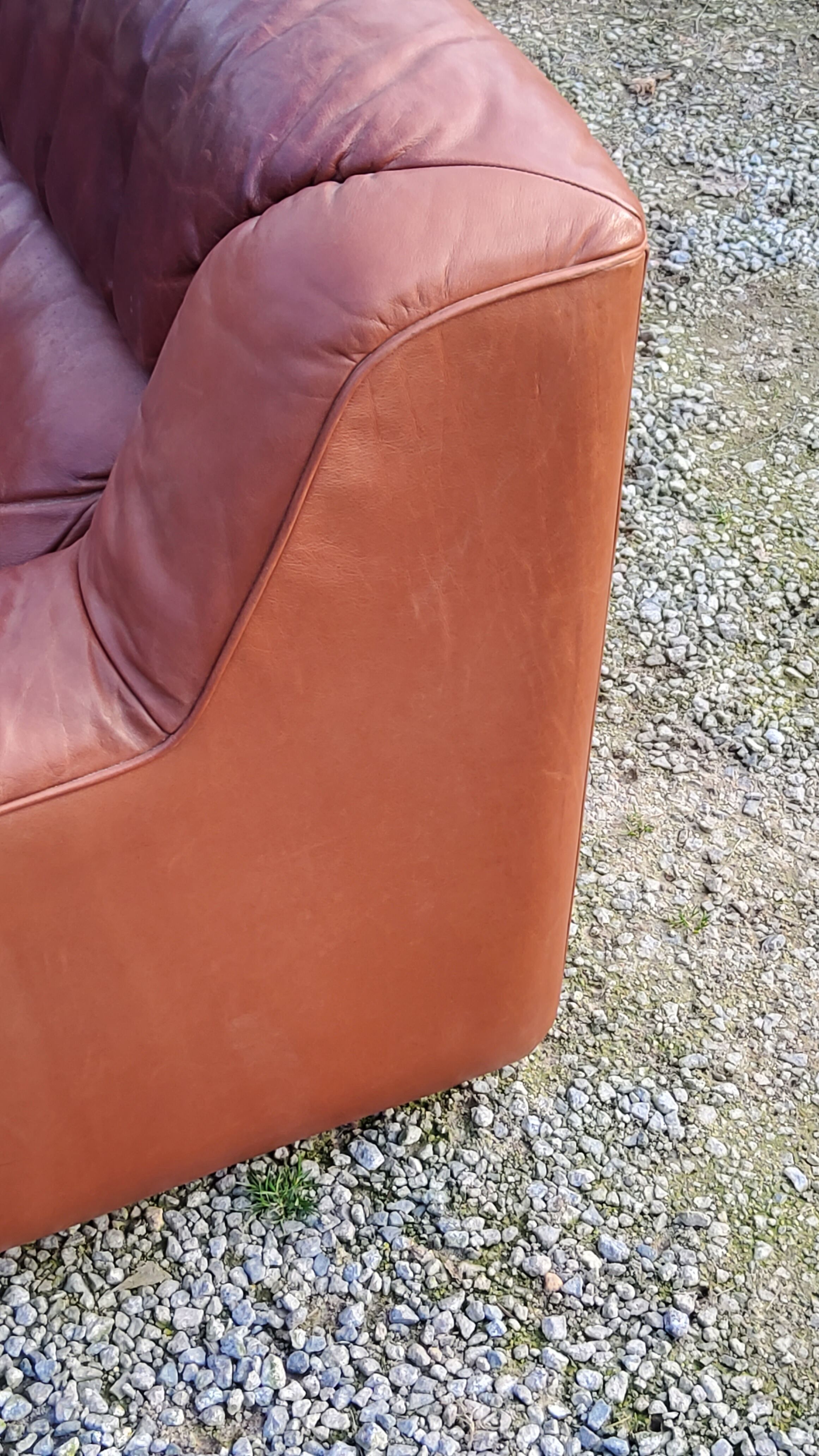 Pair of armchairs and De Sede sofa in cognac leather from the 70s/80s