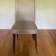Pair of vintage mahogany and skai chairs